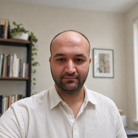 Murat E.